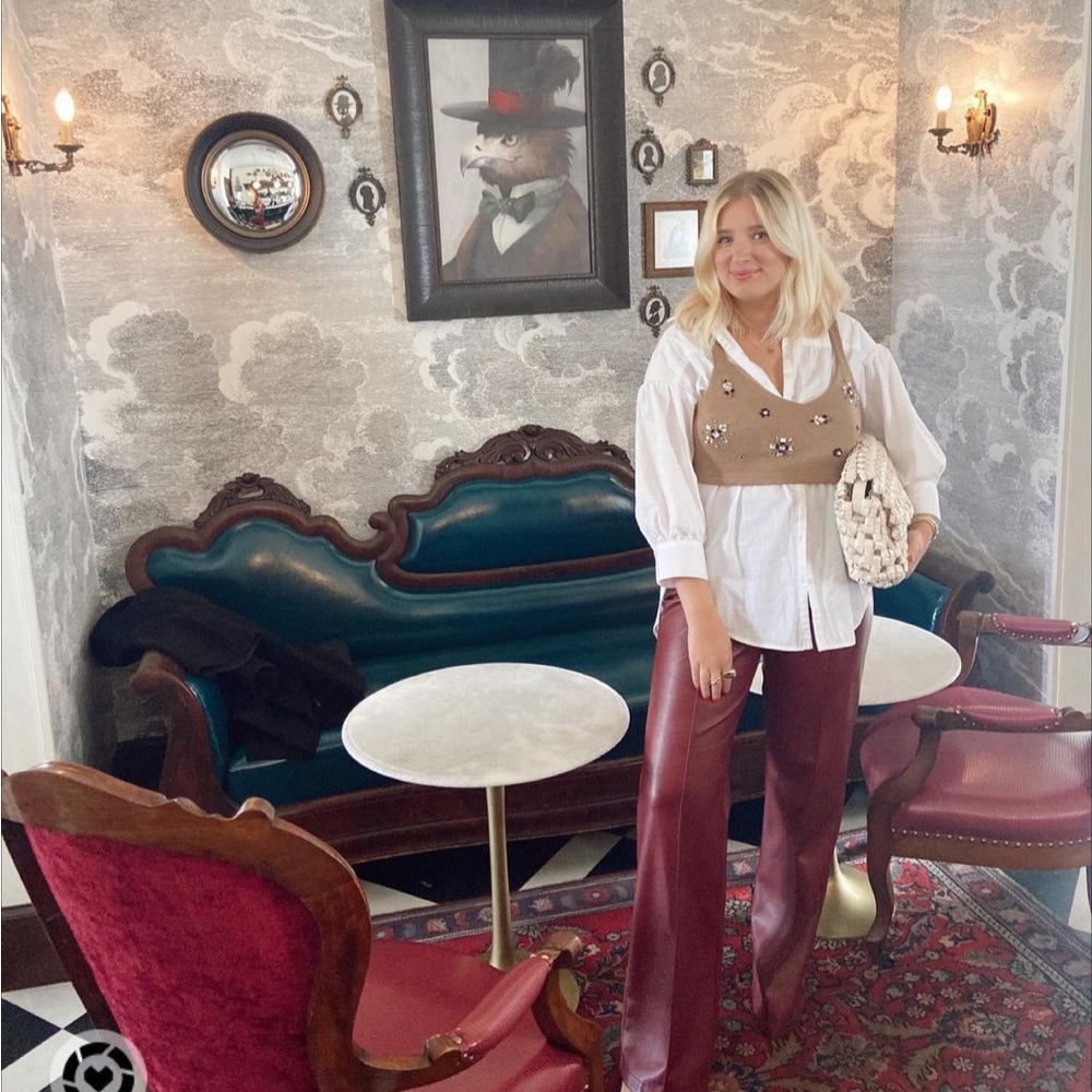 Burgundy faux leather flared pants